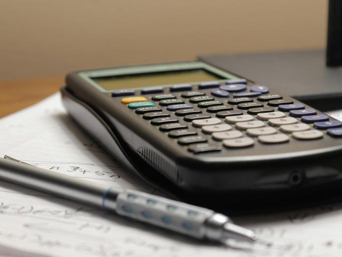 Calculator and pen